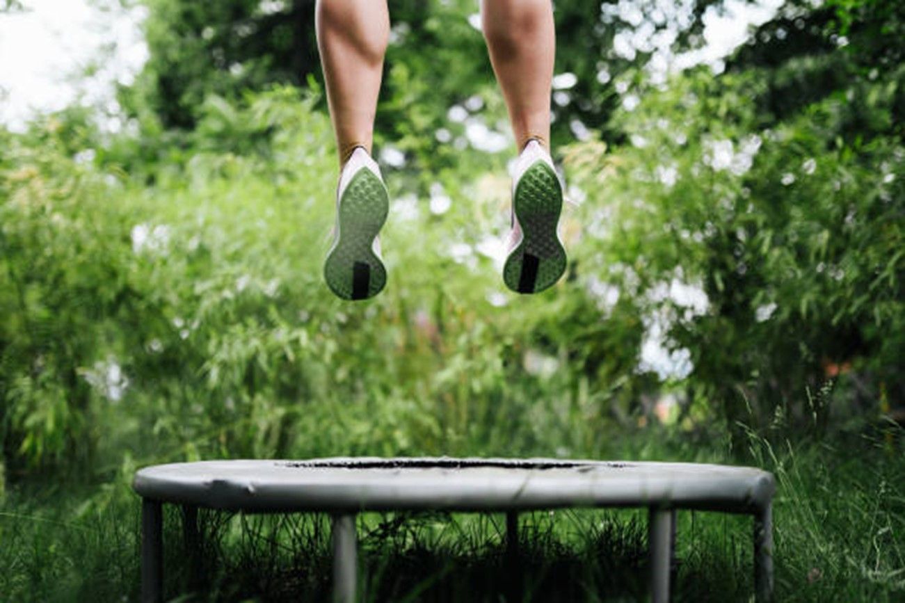 Jumping on a trampoline