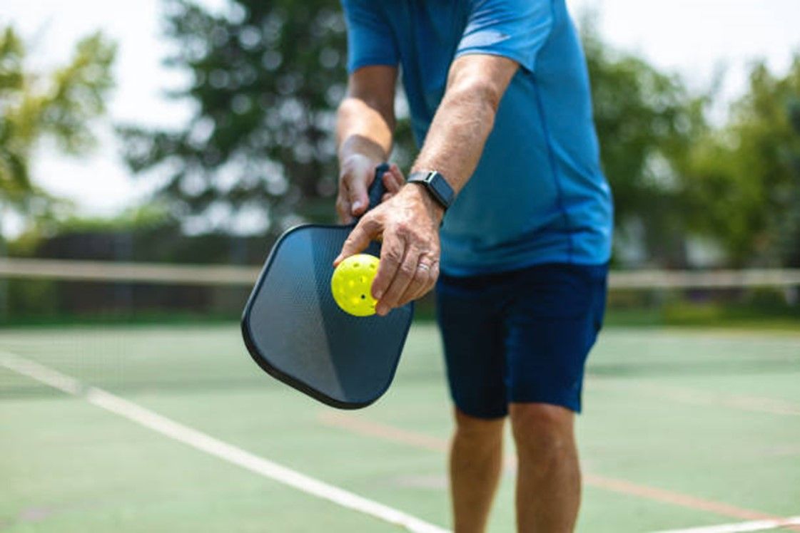 Man getting ready to serve